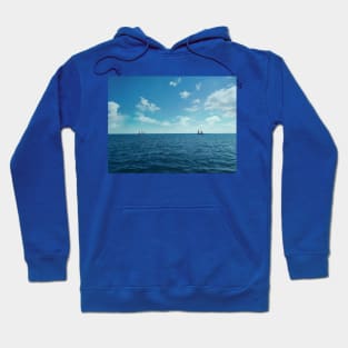 two boats floating Hoodie